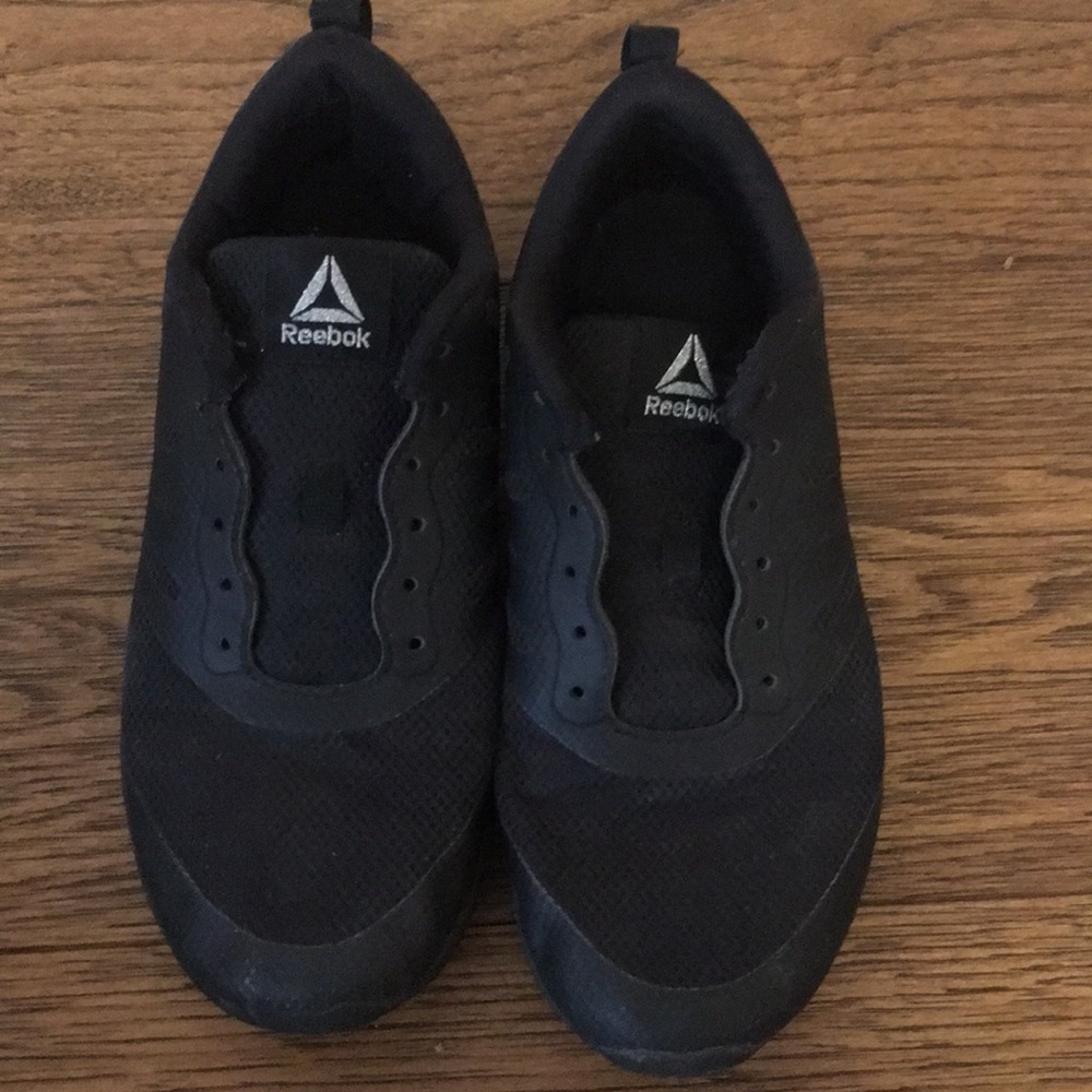 Black and gray Reebok sneakers